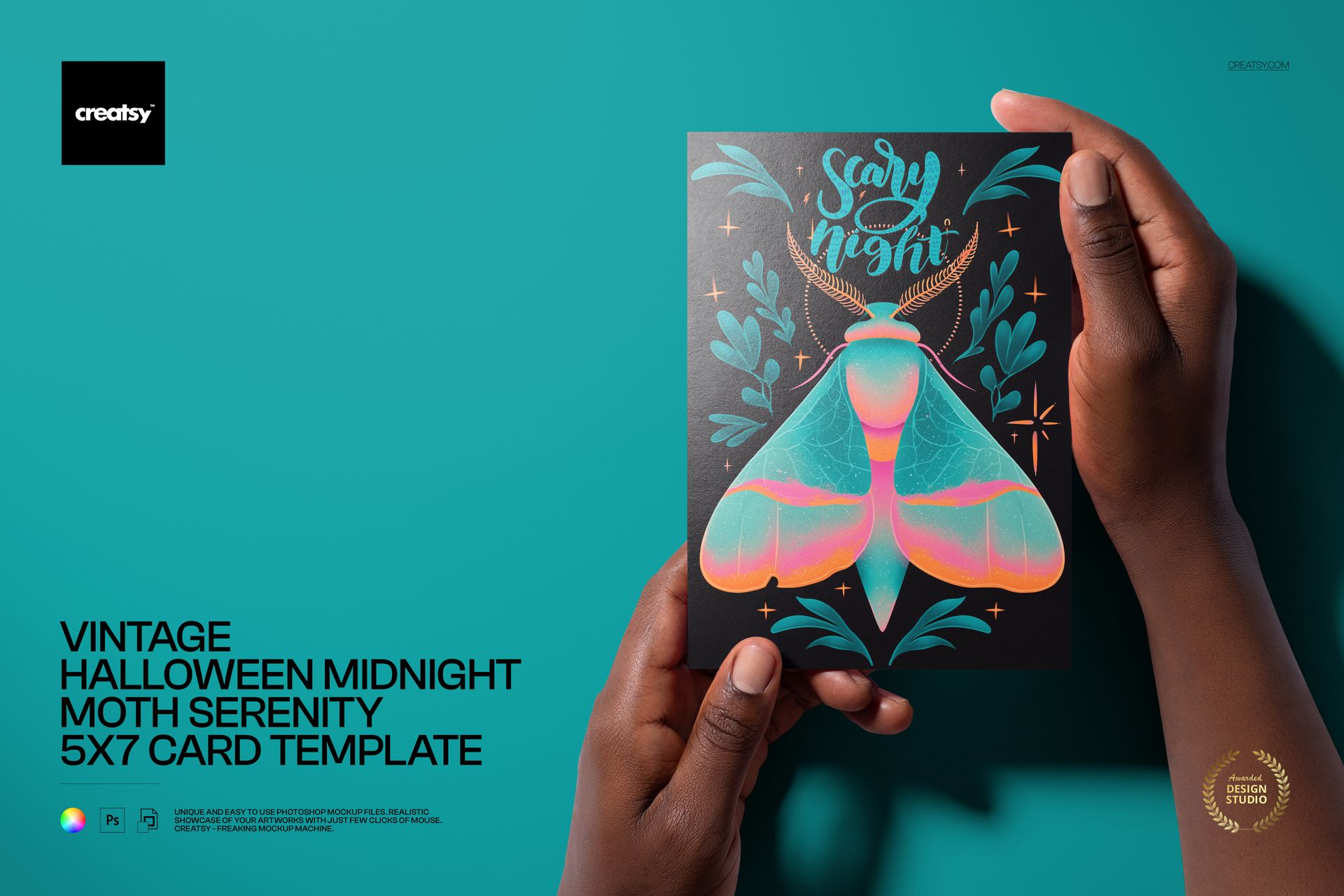 PSD mockup of a folded card with a Halloween midnight moth design, shown against a dark backdrop with two hands holding it.