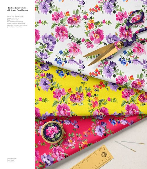 Three layers of cotton fabric in bright floral prints, arranged with scissors, ruler, and thread in a flat lay mockup scene.
