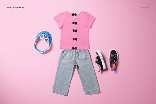 Kids t-shirt and jeans set mockup displayed on a pink background with black sneakers and a blue visor accessory.