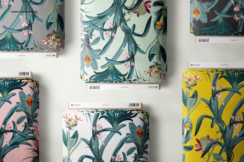 Fabric bolt mockup set showing six bolts with tropical floral patterns in various colors, viewed from above.