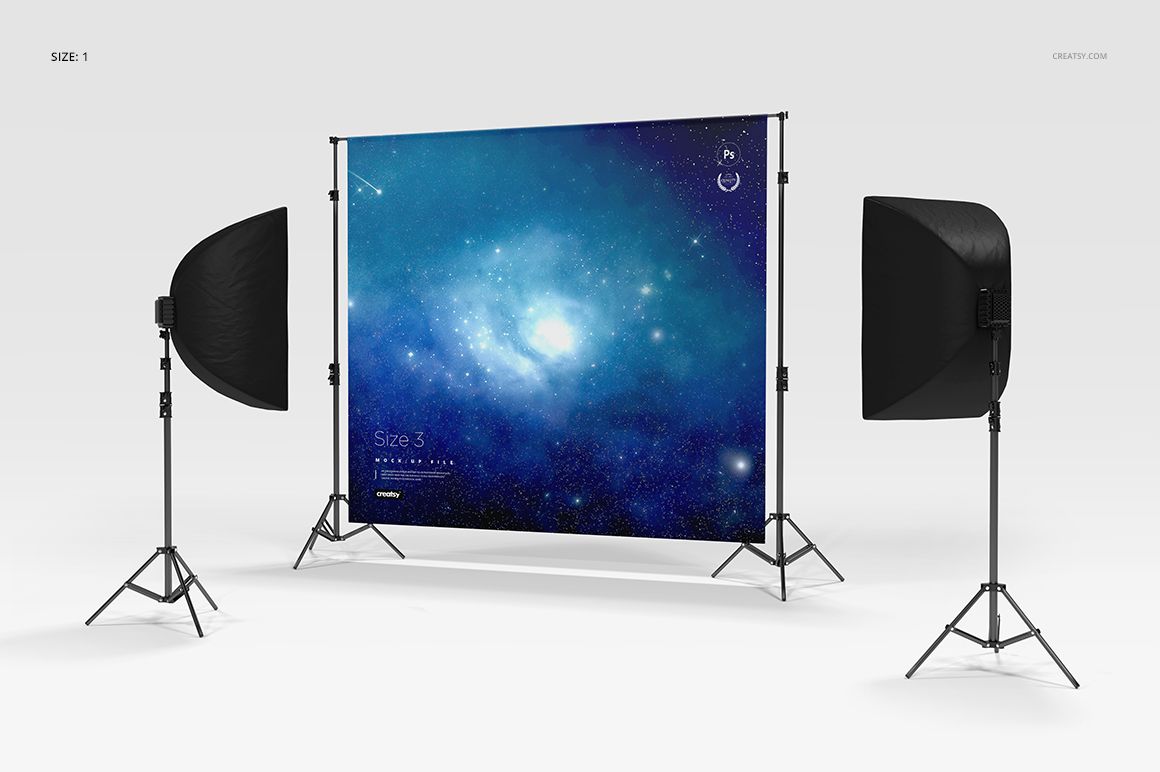 Custom printed backdrop mockup featuring a cosmic blue pattern, set up between two softbox lights in a studio.