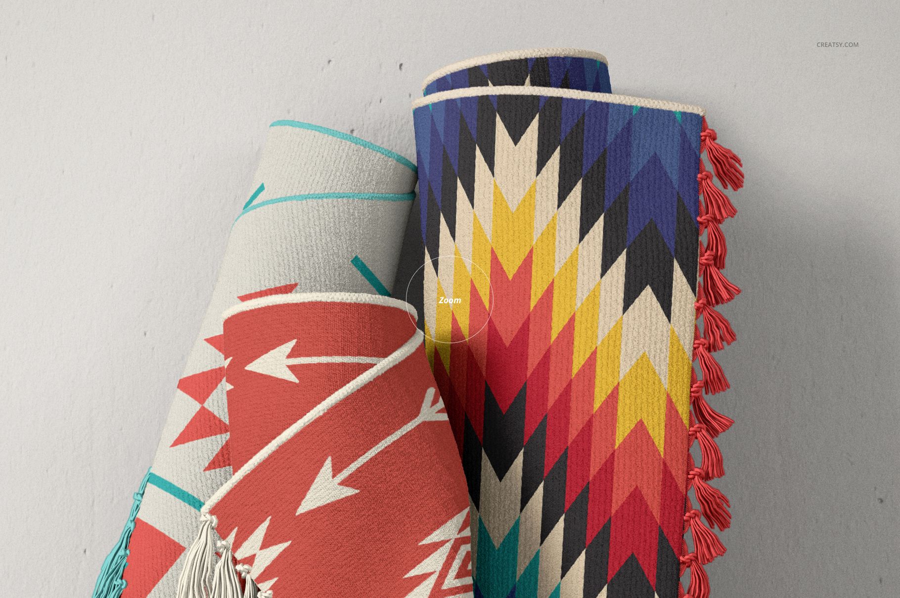 Fringed rug PSD mockup showing two upright rugs with vibrant patterns and tassels, set against a neutral background.