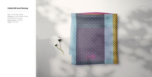 Silk scarf mockup displayed flat with a purple center, blue edges, and yellow stripes, photographed from an overhead angle.