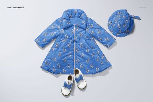 Blue floral-patterned baby coat mockup set with coordinating hat and white shoes displayed on a plain surface.