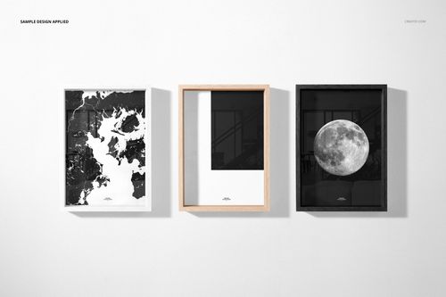PSD mockup featuring a trio of vertical wooden picture frames with abstract and moon-themed designs, arranged side by side.