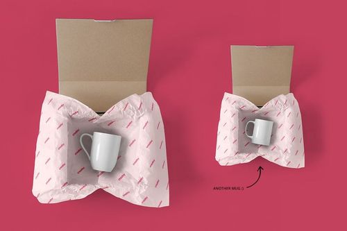 Mailing box PSD mockup set featuring open boxes with mugs wrapped in white paper, displayed on a pink surface.