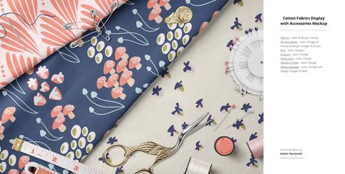 Cotton fabric mockup showing folded textiles in pink, navy, and cream floral designs, arranged with sewing tools and notions.