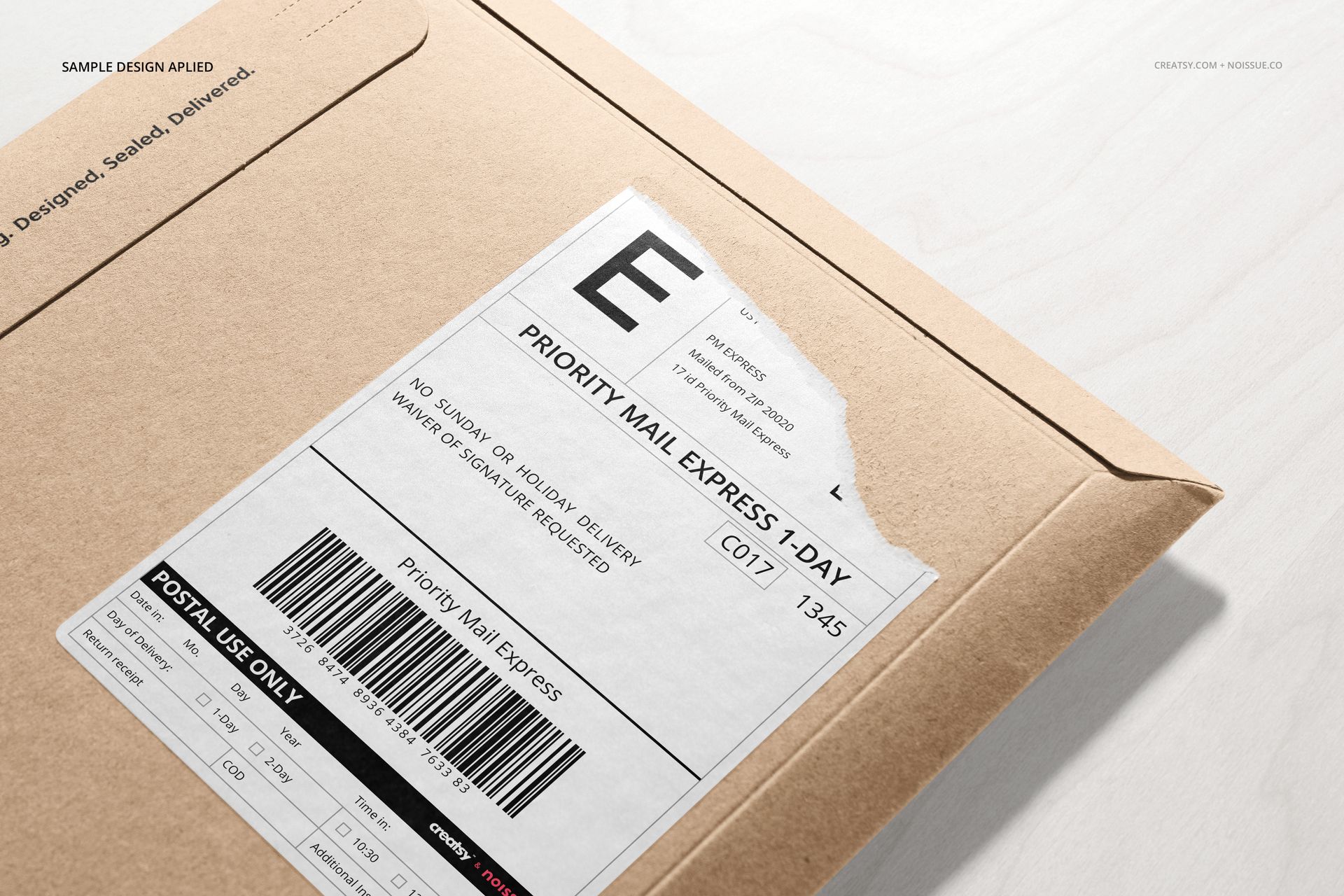 Mockup of a kraft mailer envelope with a printed shipping label, viewed from a diagonal top perspective on a light surface.