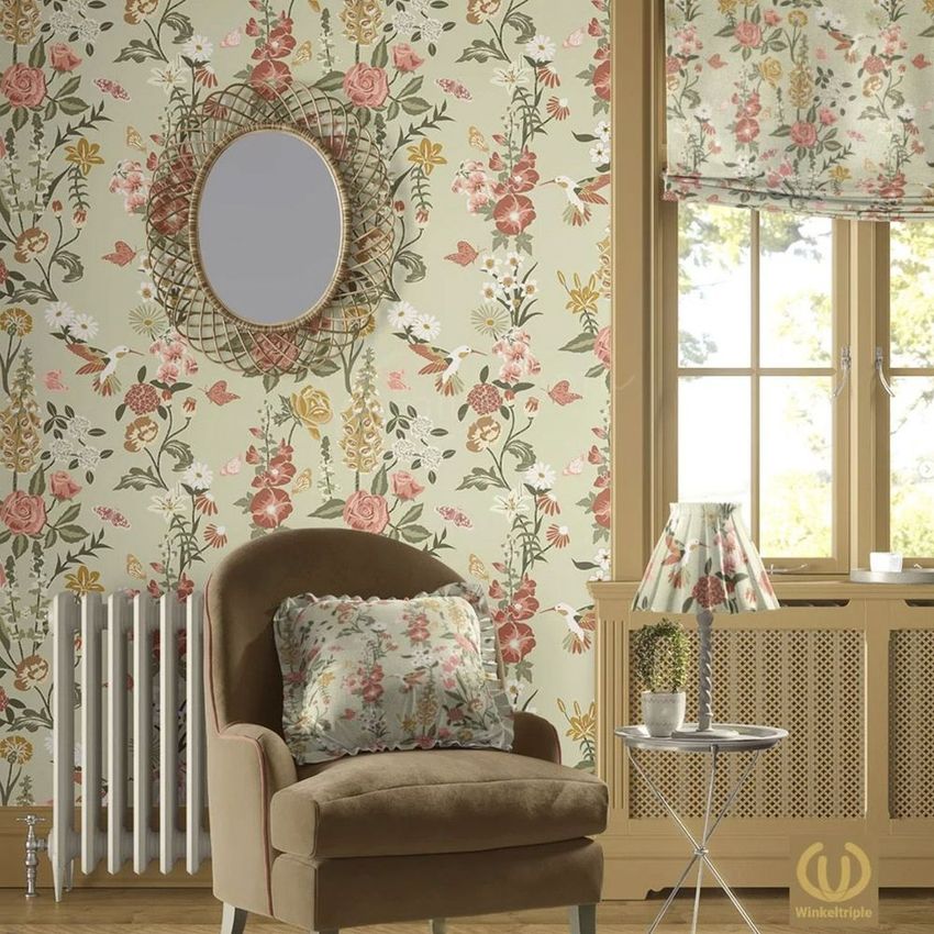 Upholstered armchair mockup in a cottagecore scene with floral wallpaper, matching pillow, and lamp beside a window.