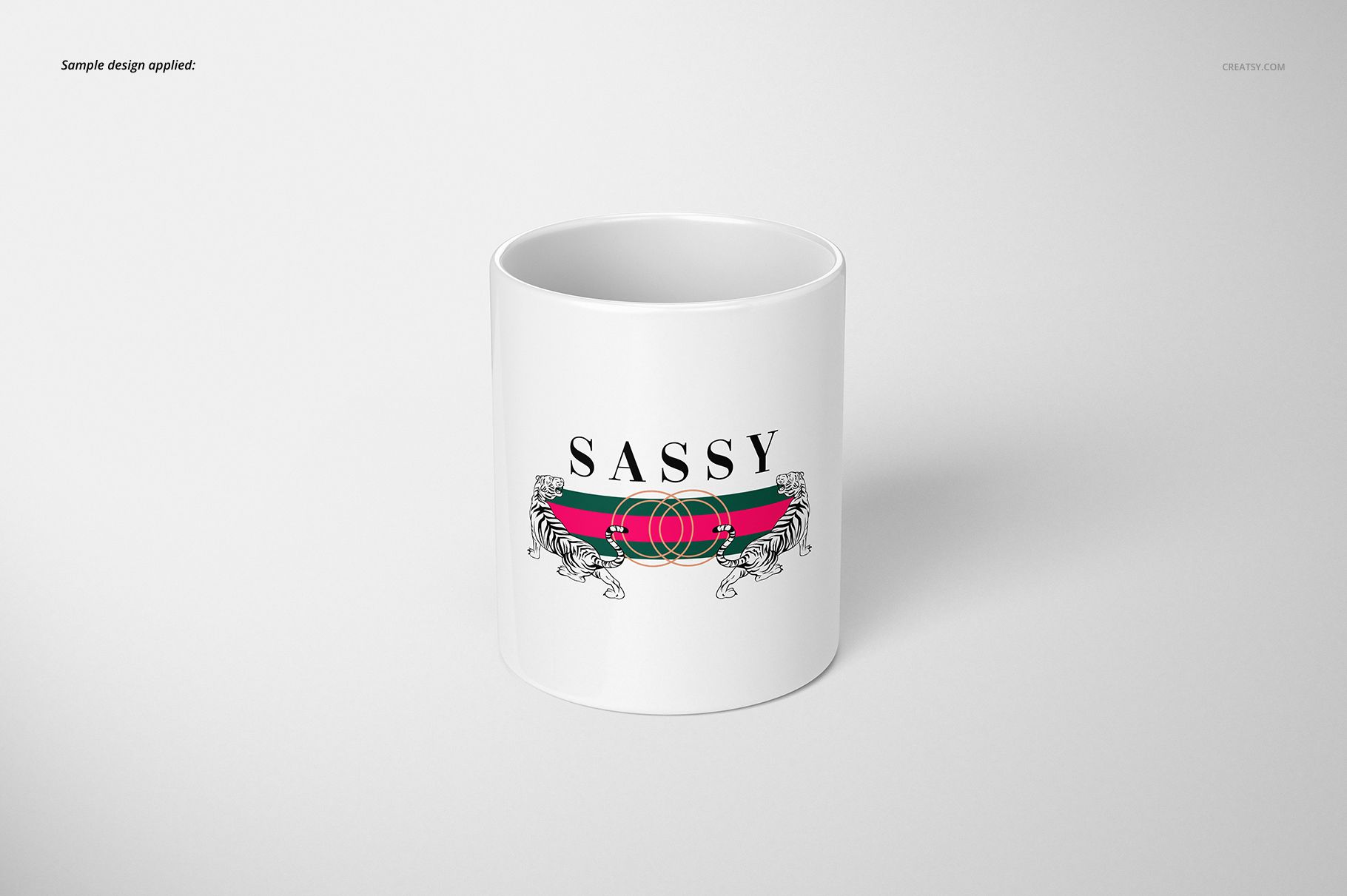 Front view of a white 11oz mug with a bold 'SASSY' text and decorative graphic, placed on a light background.