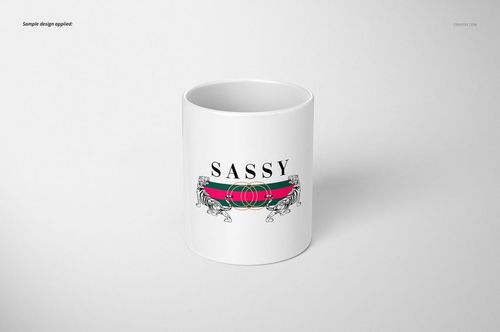 Front view of a white 11oz mug with a bold 'SASSY' text and decorative graphic, placed on a light background.