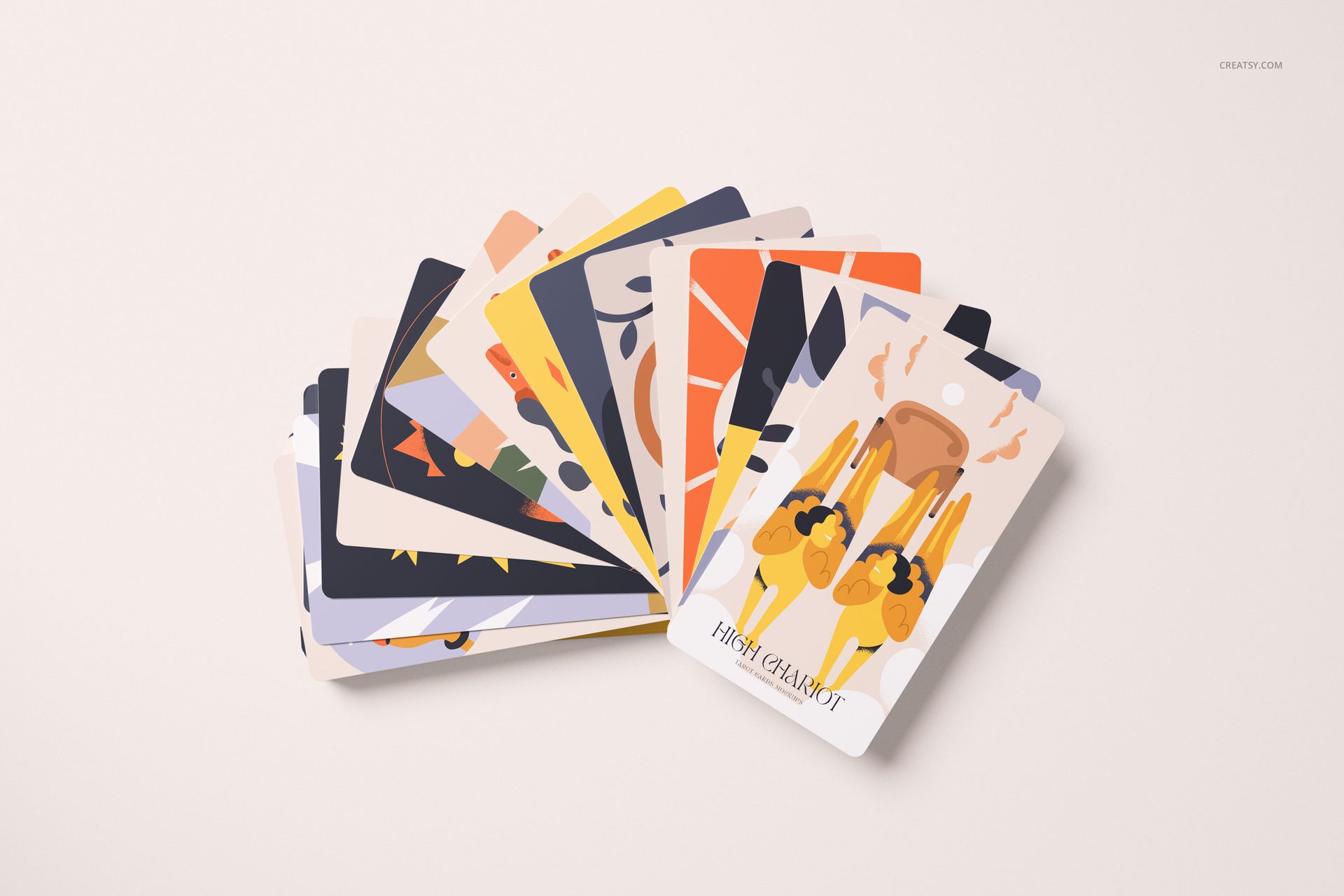 PSD mockup of tarot cards spread out in a fanned layout, showing multiple graphic patterns and soft lighting.