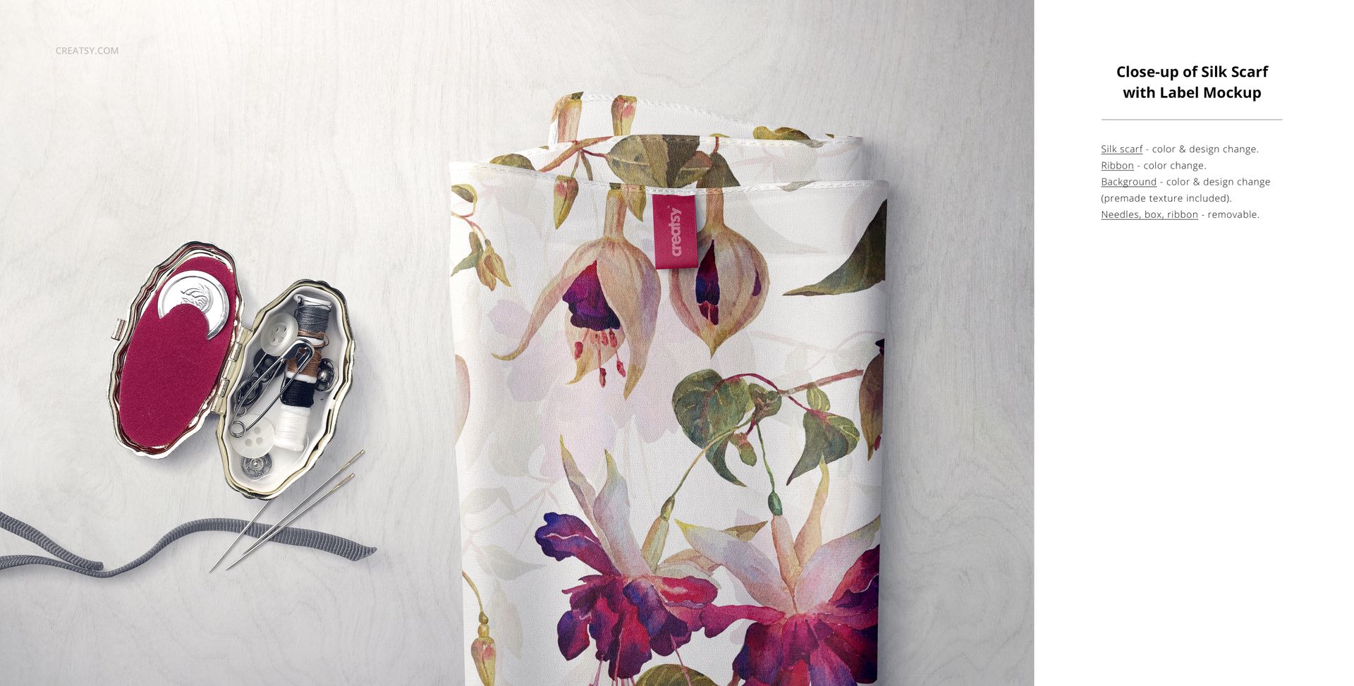 Folded silk scarf mockup featuring a botanical print, shown with needles and thread in a decorative case.