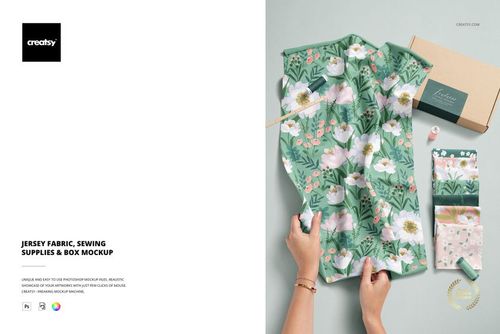 Jersey fabric mockup with a floral pattern, sewing supplies, and packaging box displayed from a top perspective.