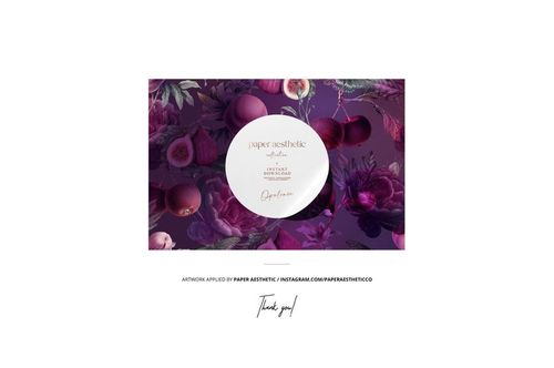 Top-down perspective of a fabric bolt mockup displaying a vivid purple botanical design and circular label detail.