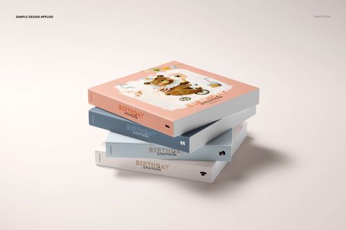 PSD mockup featuring a set of board books in soft pink, blue, and white tones, arranged in a neat pile.