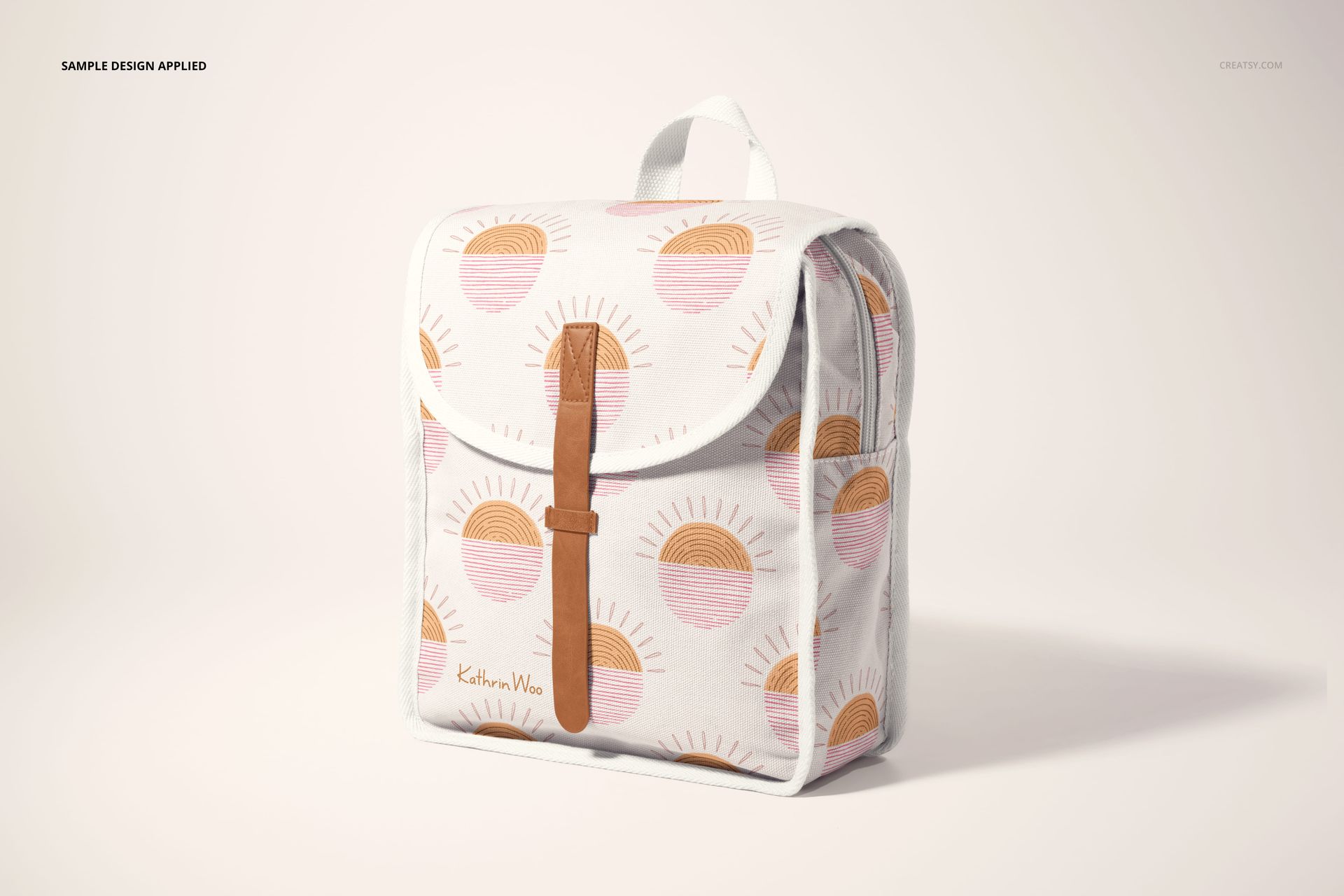Kids backpack mockup with a white background, featuring a sun pattern in orange and pink tones, shown from a front angle.