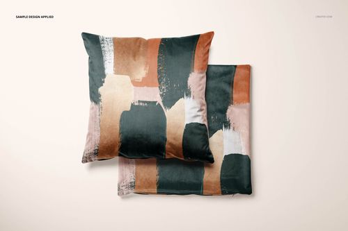 Velvet cushion cover PSD mockup featuring two pillows with artistic abstract design in earthy and neutral colors.