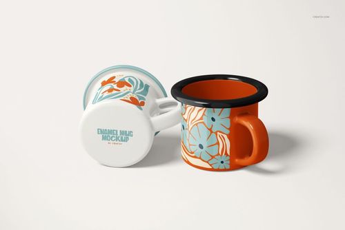 Two 100ml enamel mugs with floral patterns, one upright with orange accents and one upside down, on a white surface.