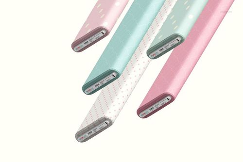 Five fabric bolts displayed diagonally, featuring pastel pink and blue colors with various subtle patterns.