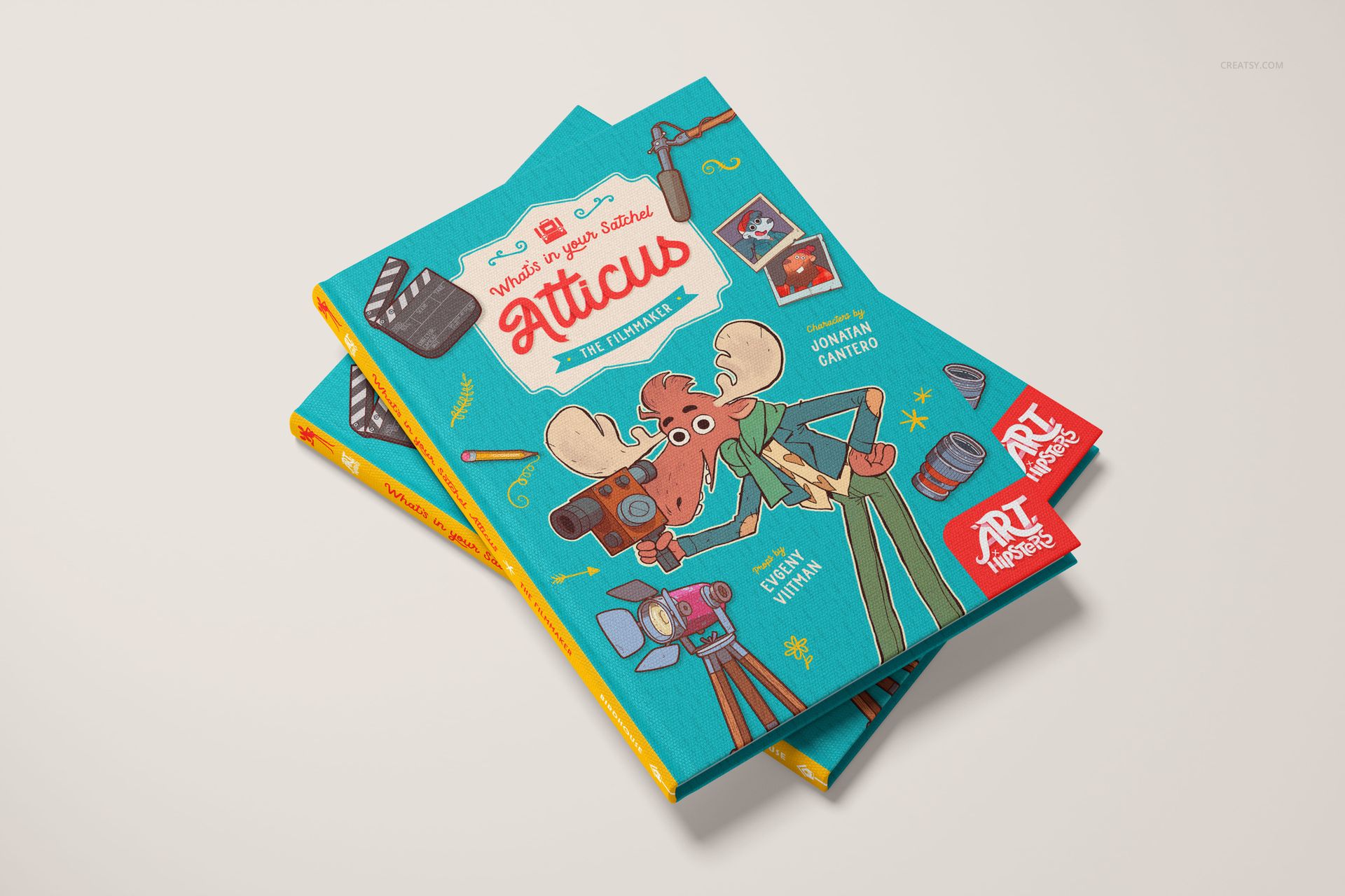 PSD mockup of hardcover books with illustrated covers, positioned one atop the other on a neutral background.