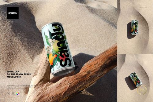 200ml can with colorful fruit graphics resting on sandy beach next to driftwood, shown in bright sunlight.