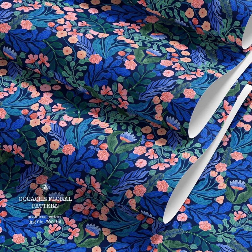 Paper wallpaper mockup featuring a seamless gouache floral pattern in blue, green, and pink, shown with curled edges.