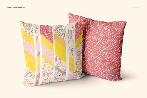 PSD mockup of rectangular throw pillows, showing multicolored geometric and red organic patterns side by side.