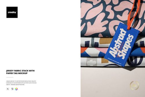 Jersey fabric stack mockup showing folded textiles with bold patterns and a prominent blue tag on top.