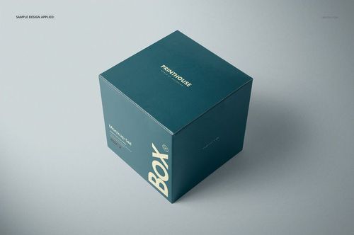 Glossy square gift box mockup in dark teal color with white text, shown from an angled top front perspective on a light background.