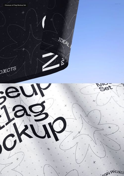 Detailed PSD mockup featuring a black and white flag with graphic text and star-like shapes, photographed outdoors.