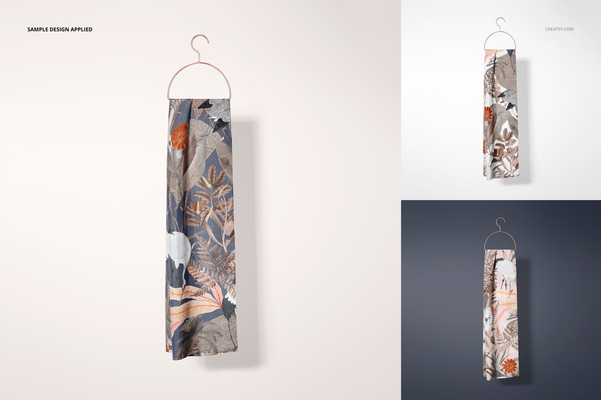 Mockup of a silk scarf with nature-inspired motifs, shown hanging on a simple hanger with varied backdrop colors.