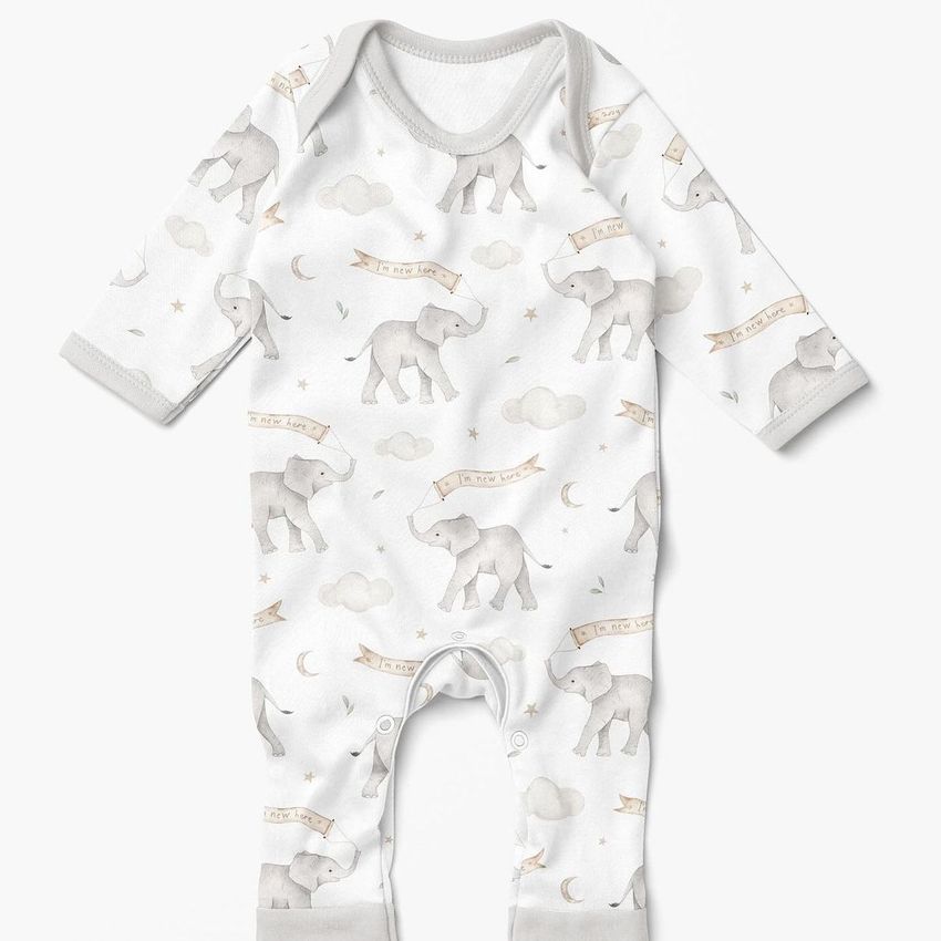Baby chest rompersuit mockup featuring a white long-sleeve onesie with a repeating elephant pattern and soft gray trim.
