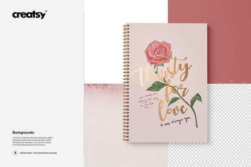 Front view of an A4 notebook mockup with square holes, spiral binding, and a floral design on a pink cover.