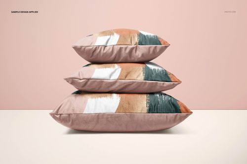 PSD mockup of velvet cushion covers stacked horizontally, each with a unique artistic pattern and soft pastel background.