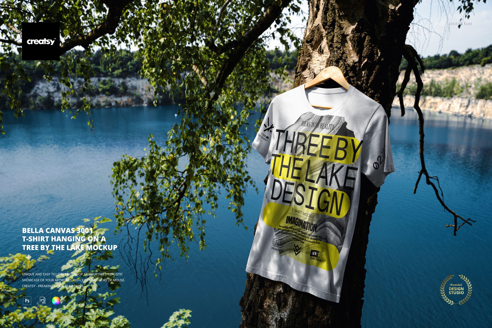 Front view of a Bella Canvas 3001 t-shirt mockup displayed on a tree by a lake, surrounded by leafy branches.
