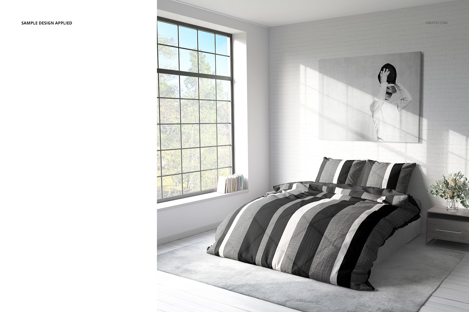 Front view of a double bed featuring a striped bedding mockup in black, gray, and white, set in a bright room.