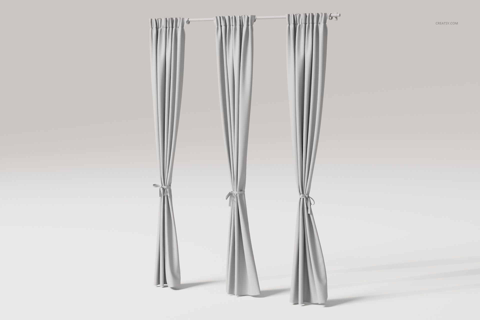 Front view of three luxury tie back curtains in light gray fabric, neatly draped and hanging from a simple rod.