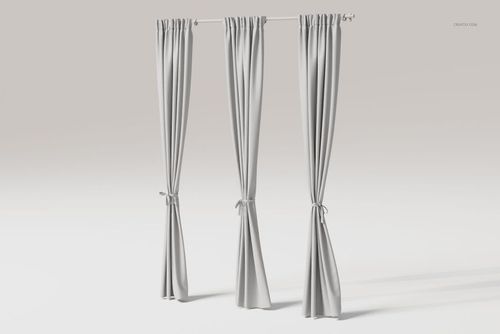 Front view of three luxury tie back curtains in light gray fabric, neatly draped and hanging from a simple rod.