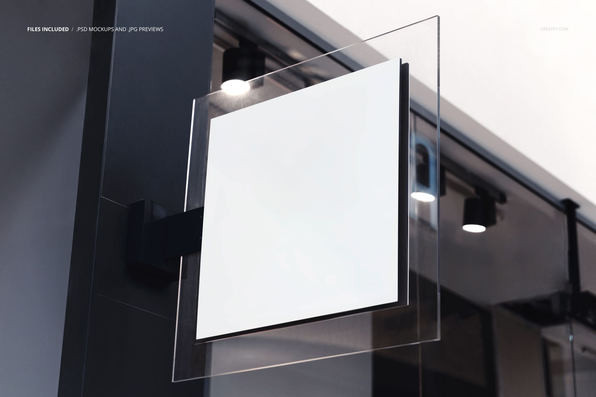Square light box sign mockup mounted on a dark wall indoors, featuring a blank white display surface.