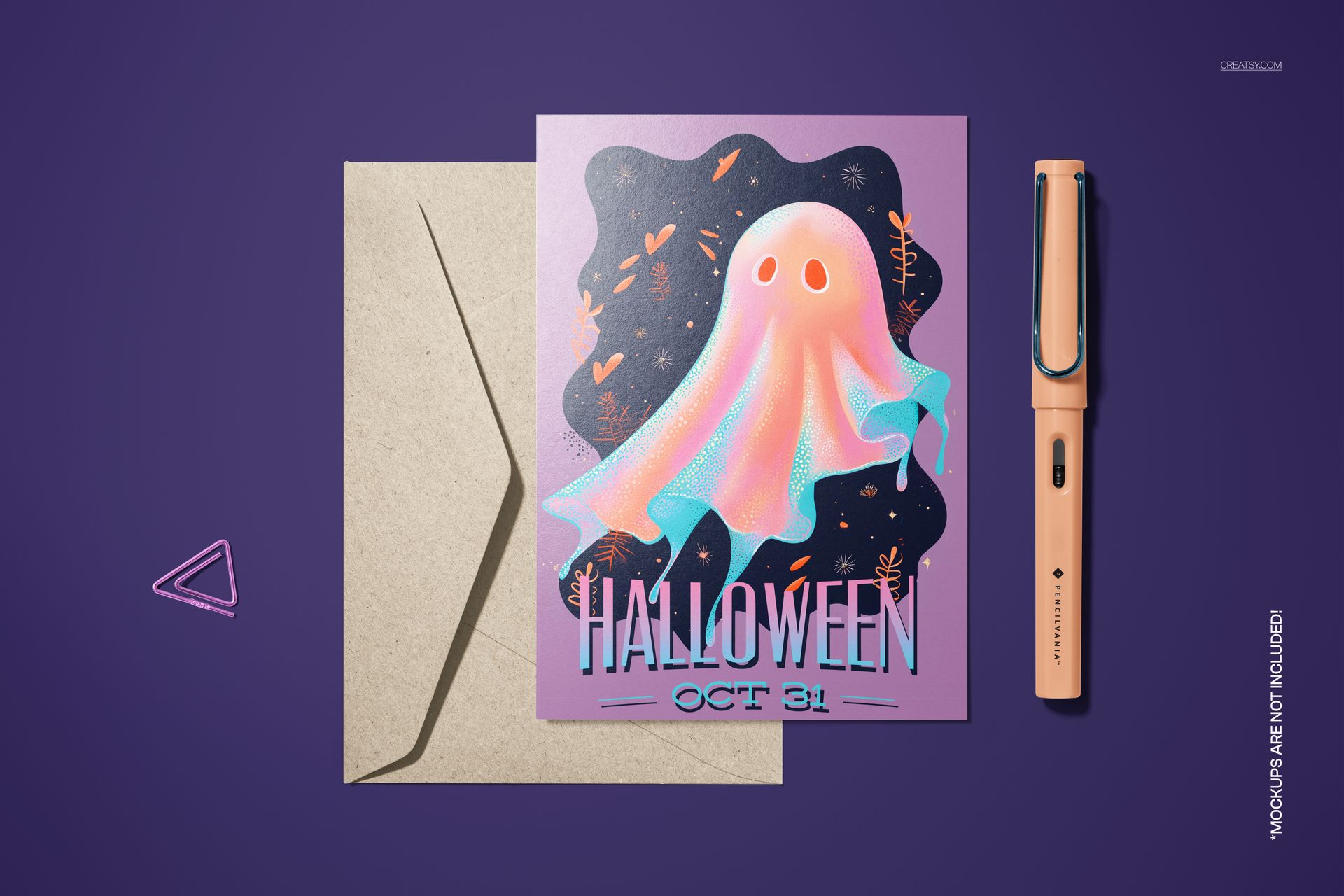 Halloween card mockup with ethereal ghost artwork, purple backdrop, open envelope, and peach-colored pen beside it.