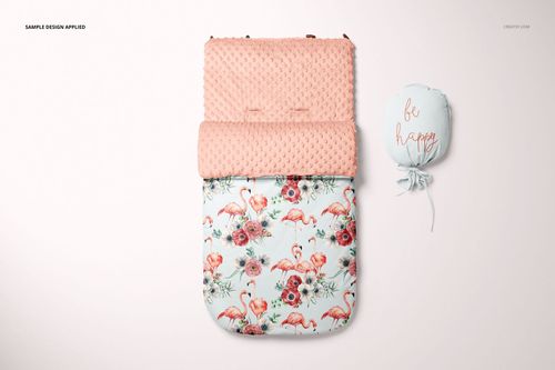 Front view of a baby sleeping bag mockup with a pink textured top and flamingo floral pattern on a light background.