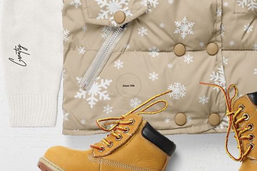 Flat lay of boys winter set mockup featuring a beige snowflake-patterned jacket, tan boots, and white knit sleeve.