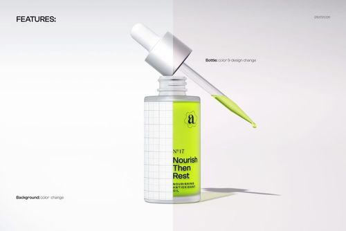 PSD mockup of an open beauty bottle with a dropper and vivid yellow contents, displayed in a front view.