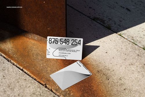 Industrial business card and poster mockup set featuring two cards on concrete and rusted metal, top view with shadows.