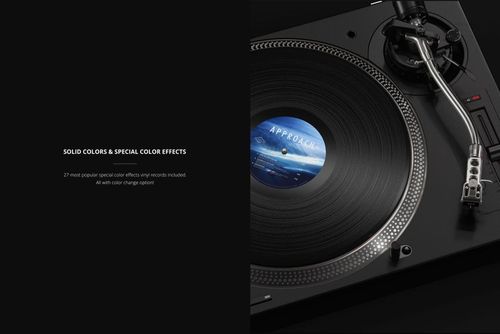 Top view of a black vinyl record on a DJ turntable, showing detailed grooves and a blue center label in a mockup scene.