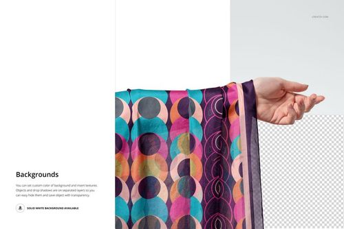 Side view of a habotai silk scarf mockup with vibrant overlapping circles, draped over an extended hand.