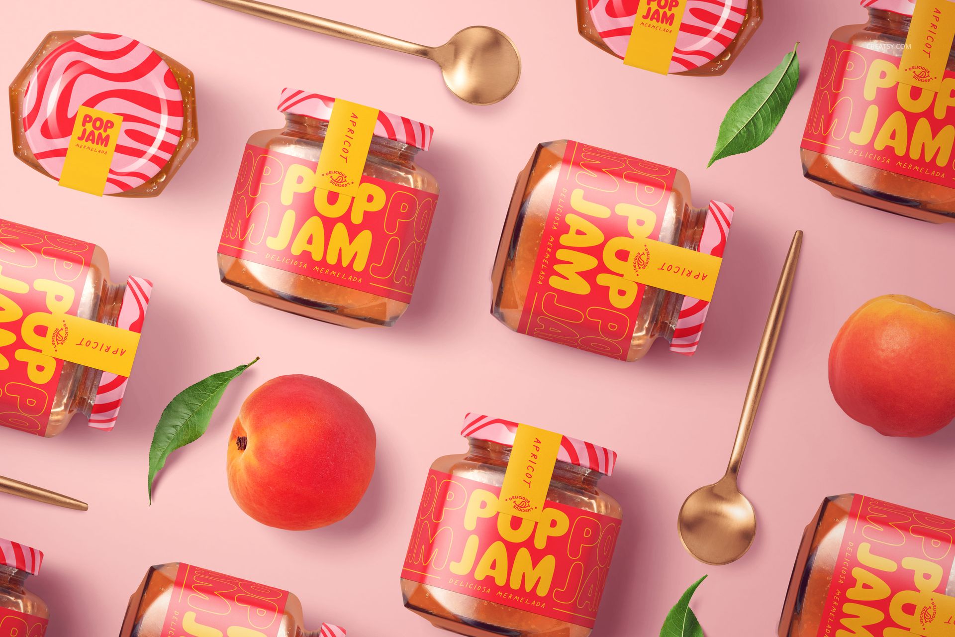 PSD mockup featuring apricot jam jars, gold spoons, and apricots on a pastel pink surface with scattered green leaves.
