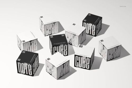 Eight note cube mockups arranged on a light surface, featuring black and white sides with bold text designs.
