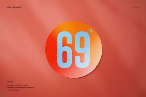 Sticker mockup featuring a circular design with orange and red hues and blue number 69, viewed from above.